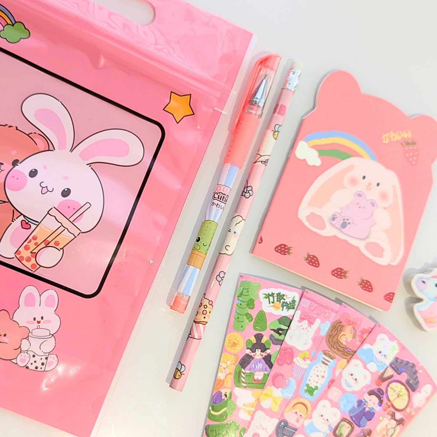Pochette surprise rose kawaii, stickers, autocollants, stylo, crayon, carnet, gomme